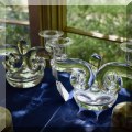 G23. Steuben glass candleholders. 
